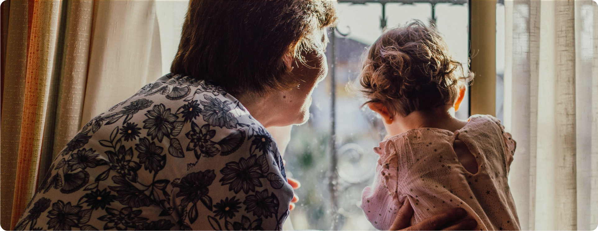 Family looking through window